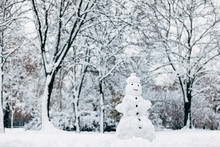 Simple Snowman In Snowy Forest In Snowfall