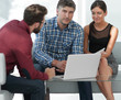© ASDF - young people studying with laptop and tablets at table