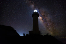The Uganzaki Lighthouse At Night With The Milky Way Behind It In Ishigaki, Okinawa, Japan