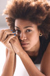 © BONNINSTUDIO/Stocksy - Portrait of young beautiful african american woman.