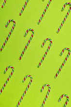 Candy Canes On Green Background