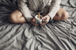 © lumina/Stocksy - Woman Drinking Hot Coffee in Bed in the Morning