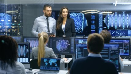 Fototapete - Project Manager Introduces New Head of the Department. Team of Engineers and Programmers are Building Machine Learning System. Displays Show Working Model of Neural Network. 
