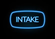 Intake  - colorful Neon Sign on brickwall