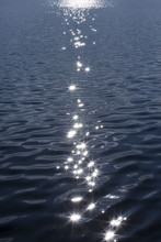 Sunshine Sparkling On The Water