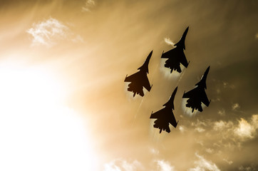 Poster - Group of fighter jet airplane sun glow blue sky.