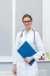 © LIGHTFIELD STUDIOS - female doctor with clipboard