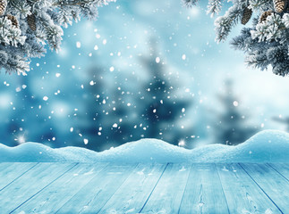 Merry christmas and happy new year greeting background with table .Winter landscape with snow and christmas trees