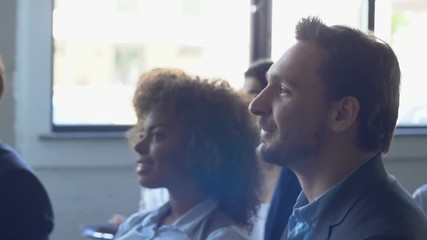 Wall Mural - Group Of Business People Listening To Presentation At Seminar, Meeting Of Mix Race Businesspeople Team Slow Motion