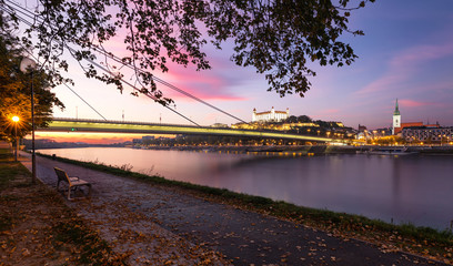 Wall Mural - Autum sunset with Bratislava castle and Danube river