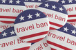 © cbies - USA Politics News Badges: Pile of Travel Ban Buttons With US Flag, 3d illustration