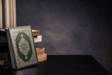 Koran - Holy Book Of Muslims ( Public Item Of All Muslims ) On The Table , Still Life