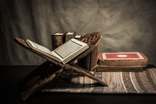 Koran - Holy Book Of Muslims ( Public Item Of All Muslims ) On The Table , Still Life
