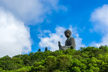 Wall Mural - Hongkong scenic Tian Tan Buddha or Big Buddha, a large bronze statue at Ngong Ping, Lantau Island, Hong Kong.