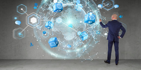 Poster - Businessman using digital planet earth interface on a wall 3D rendering