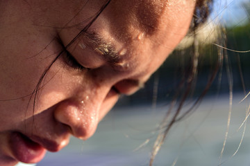 Closeup  sweating on face asian women . Exercise on park