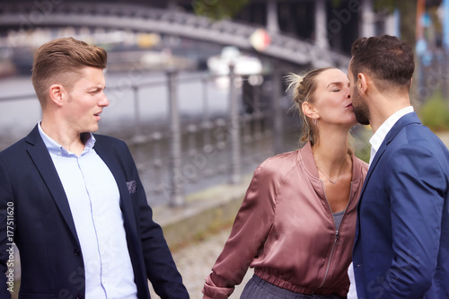 Cuadros en Lienzo woman kissing man while another is upset
