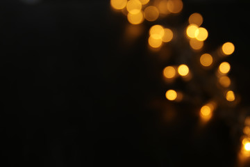 abstract bokeh background of golden light burst.