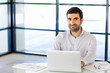 © Sergey Nivens - Handsome businessman working at computer