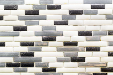 Black white and gray glass tile backsplash