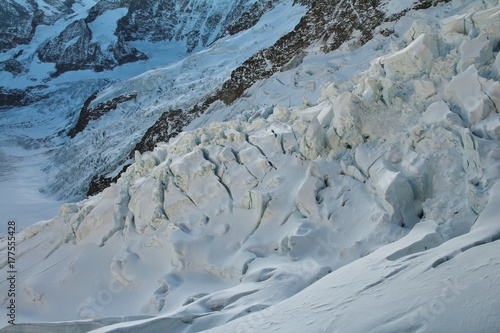 Fotografie, Obraz Cracked ice of the Eiger glacier, Switzerland.