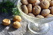 © svf74 - Italian Christmas cookies amaretti in a white heart shaped bowl.Tasty Italian amaretti biscuits on old wooden table.Amarettini cookies.Selective focus.