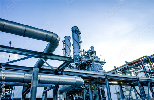 Photographie Industrial view at oil refinery plant form industry zone with cloudy sky