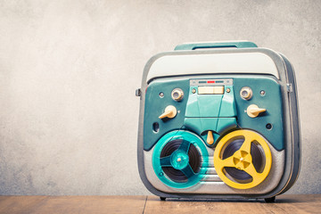 Wall Mural - retro reel to reel tape recorder front concrete wall background. vintage style filtered photo