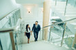 © alfa27 - business people climbing a stair in a building on a morning