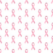 Breast cancer seamless pattern of pink ribbon on white background.