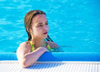 Attractive sad woman In the swimming pool
