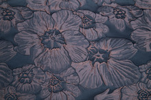 Dark Fabric With Floral Embossed Pattern