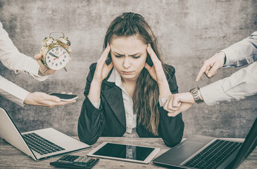 Female office worker is tired of work and exhausted.