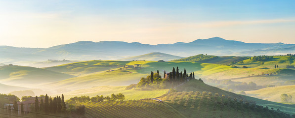 beautiful foggy landscape in tuscany, italy