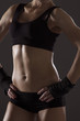 © juli_lenets - Athletic woman pumping up muscules with dumbbells