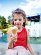 Portrait of young boy eating ice cream outdoors