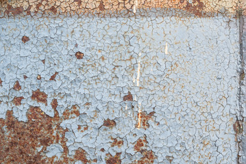 Wall Mural - surface of rusty iron with remnants of old paint, chipped paint, texture background