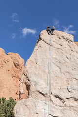 An instructor and student rock climber.