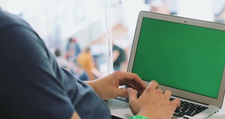 Man hands using laptop closeup green screen chroma key mockup tapping point networking communication internet surfing technology wifi male texting working browsing blank monitor pc chat online website