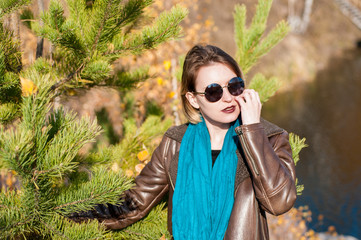 girl on a nature background autumn