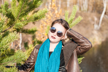 girl on a nature background autumn