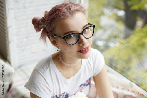 Close Up Portrait Of Beautiful Trendy Looking Girl With Pink