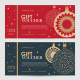 Fototapeta  - Christmas gift certificate. New Year gift voucher. Golden Christmas balls on a red and blue background. 