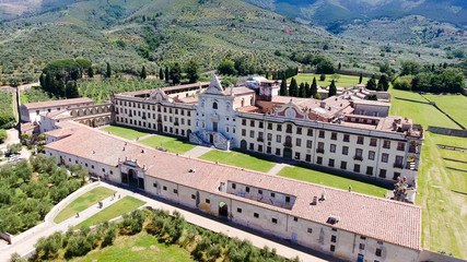 Charterhouse in Tuscany countryside, aerial view