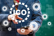 © maxsim - Businessman presses button ICO Initial Coin Offering gear engineering on virtual digital electronic user interface.