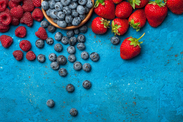 Berries assorted mix of strawberry, blueberry, raspberry. Various fresh summer berries. Top view