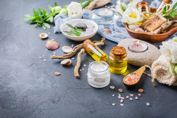 Sticker - Spa wellness setting concept with spring flowers, black background