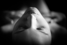 Beautiful Young Aroused Nude Woman With Closed Eyes In Dark, Monochrome