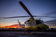 A Helicopter In A Sunset