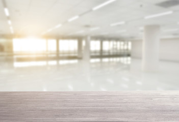 Wall Mural - top empty wood table on blurred abstract hallway background. can be used for display or montage your product.